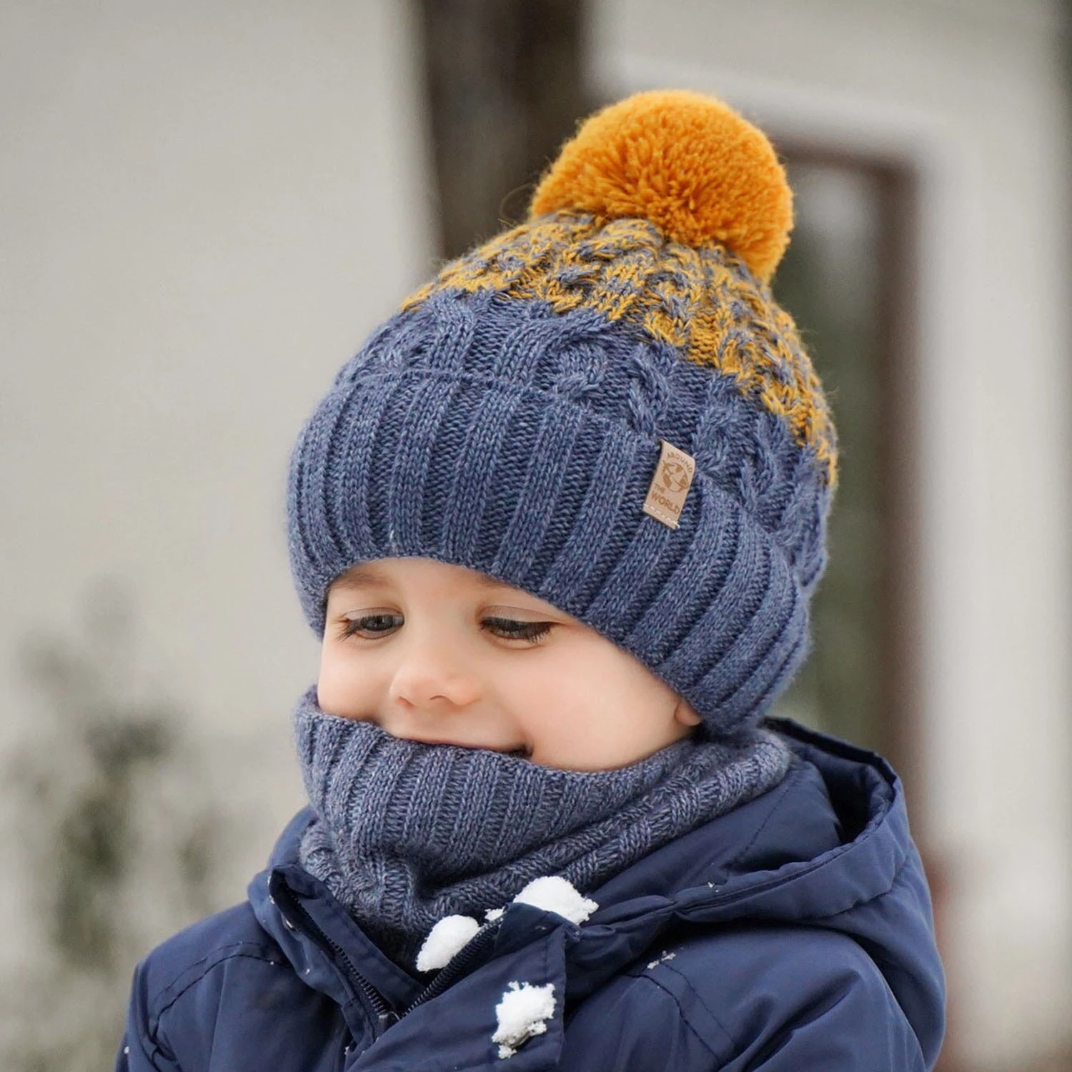 Winterset Jungen: Mütze und Schlauchschal mit Bommel Schwarz Travis