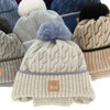 Winterset Jungen: Mütze und Schlauchschal mit Bommel Beige Pikolo