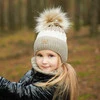 Winterset Mädchen: Mütze und Schlauchschal mit Bommel Schwarz Riviera